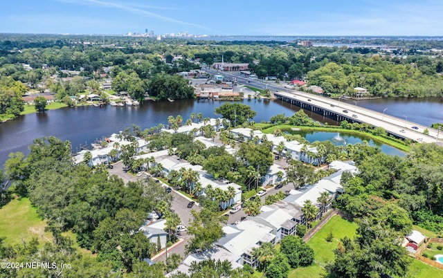 birds eye view of property featuring a water view