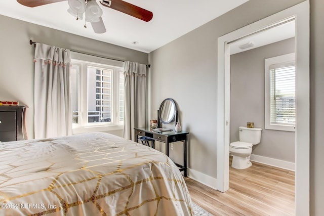 bedroom with light hardwood / wood-style flooring and ceiling fan