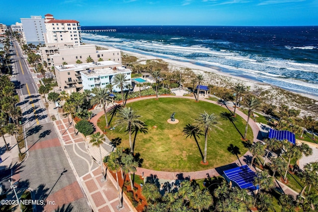 bird's eye view with a beach view and a water view