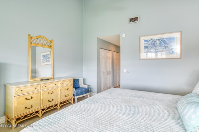 bedroom featuring a closet and hardwood / wood-style flooring