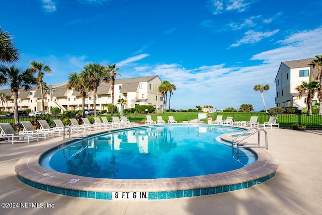 8550 A1A Unit 241, Saint Augustine, FL 32080 - pool featuring a residential view, fence, and a patio