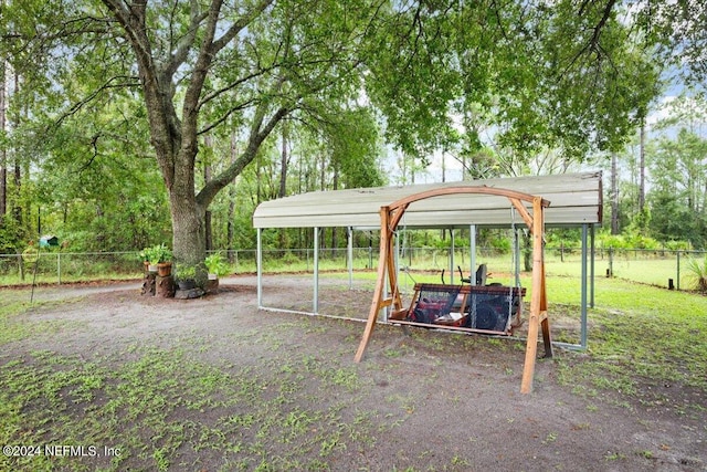 view of yard with a carport