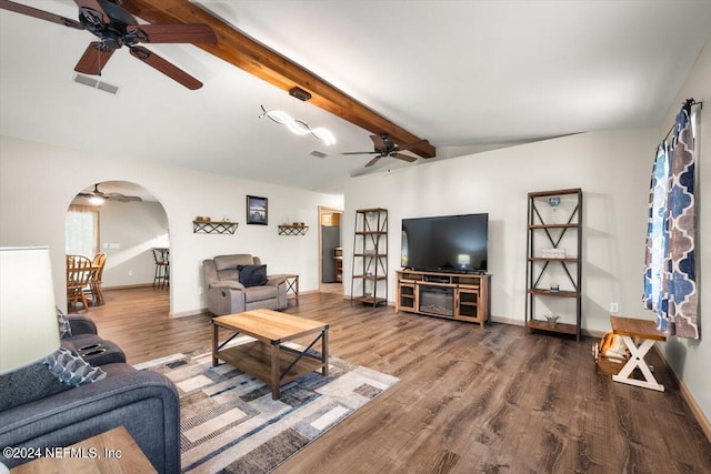 living room with wood-type flooring, vaulted ceiling with beams, and ceiling fan