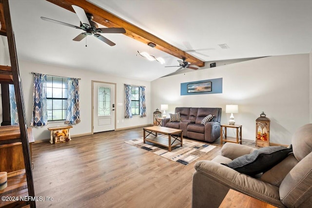 living room featuring lofted ceiling with beams, wood-type flooring, and ceiling fan