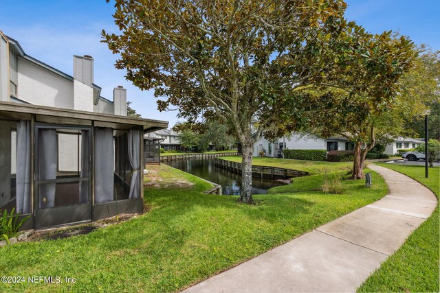 view of yard featuring a water view