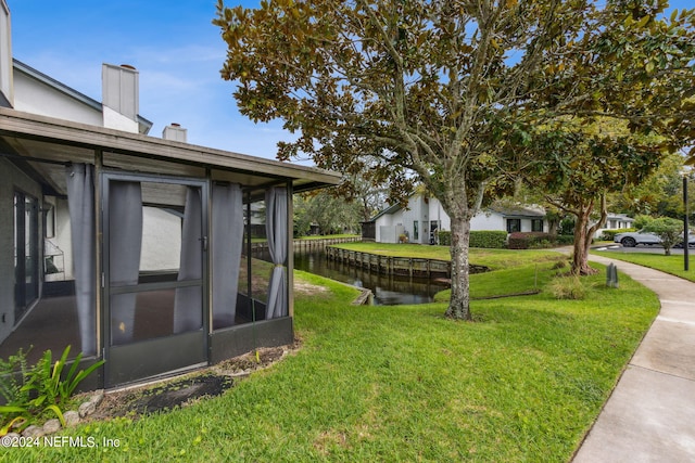 9360 Craven Rd Unit 1307, Jacksonville, FL 32257 - view of yard featuring a sunroom and a water view