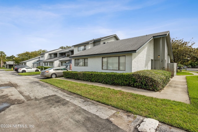 9360 Craven Rd Unit 1307, Jacksonville, FL 32257 - multi unit property with a residential view, stucco siding, and a shingled roof