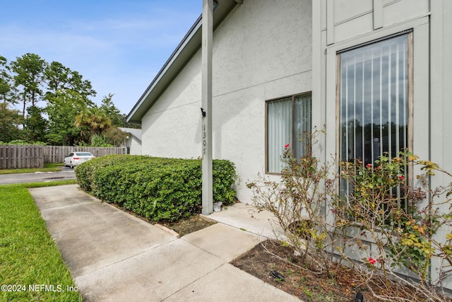 9360 Craven Rd Unit 1307, Jacksonville, FL 32257 - entrance to property featuring stucco siding and fence