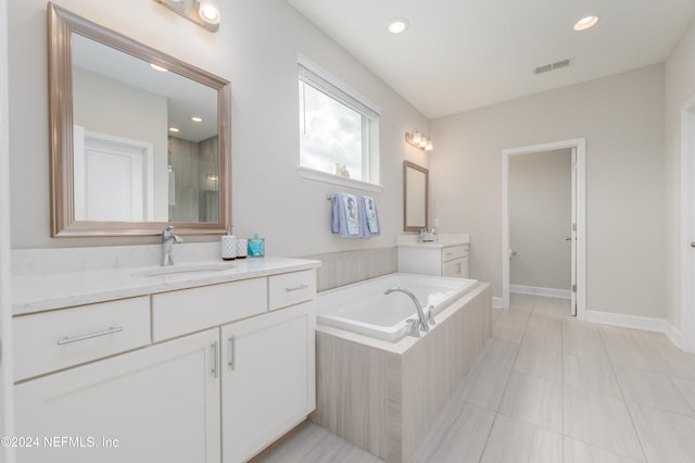 bathroom with vanity, separate shower and tub, and tile patterned flooring