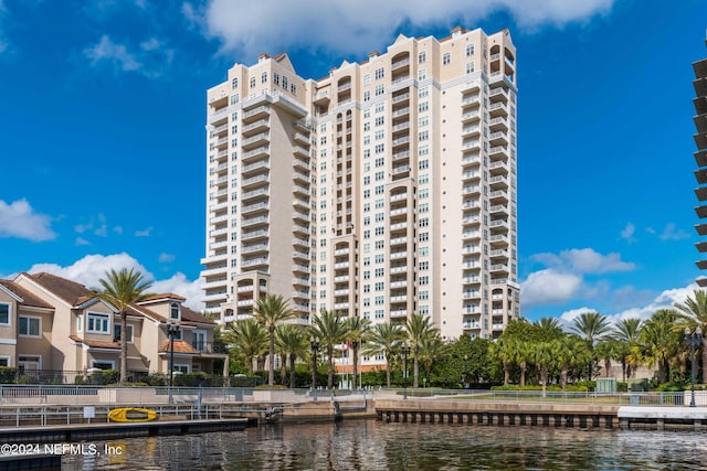 view of building exterior with a water view