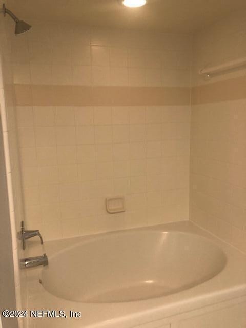 full bath with shower / bathing tub combination
