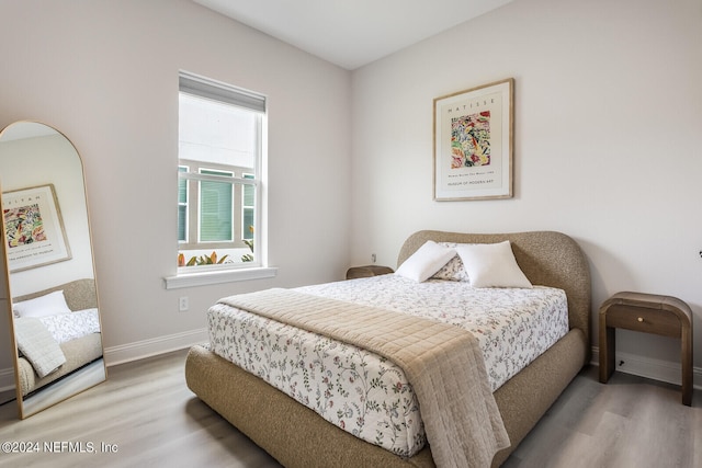 bedroom featuring light hardwood / wood-style flooring