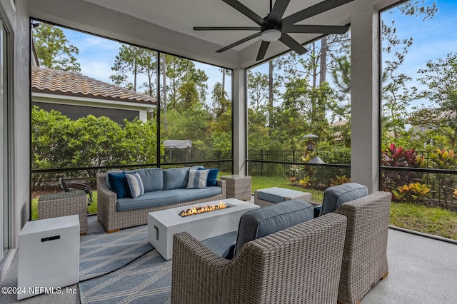 sunroom / solarium with ceiling fan