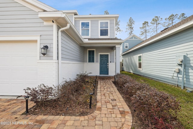 entrance to property with a garage