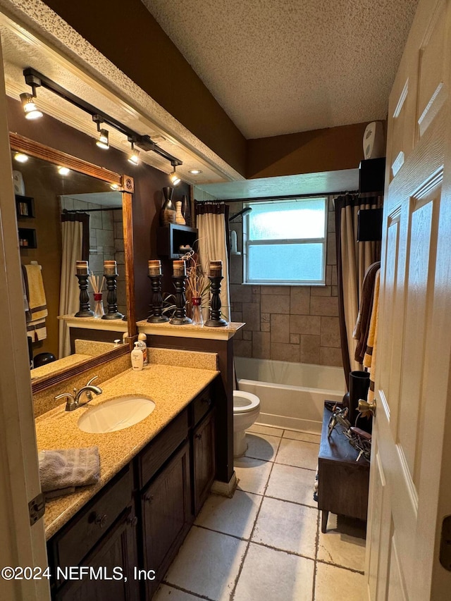 full bathroom with a textured ceiling, vanity, toilet, tile patterned floors, and shower / bathtub combination with curtain