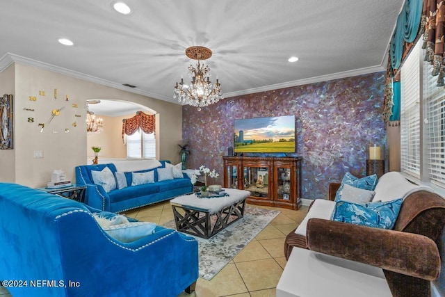 tiled living room featuring crown molding and a chandelier