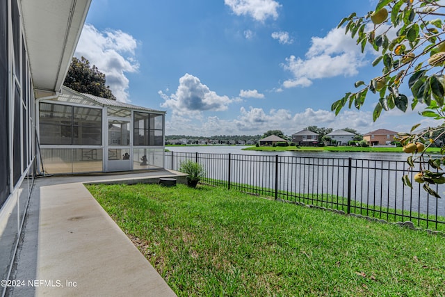 view of yard with a sunroom