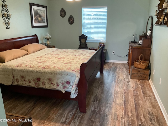 bedroom featuring hardwood / wood-style flooring