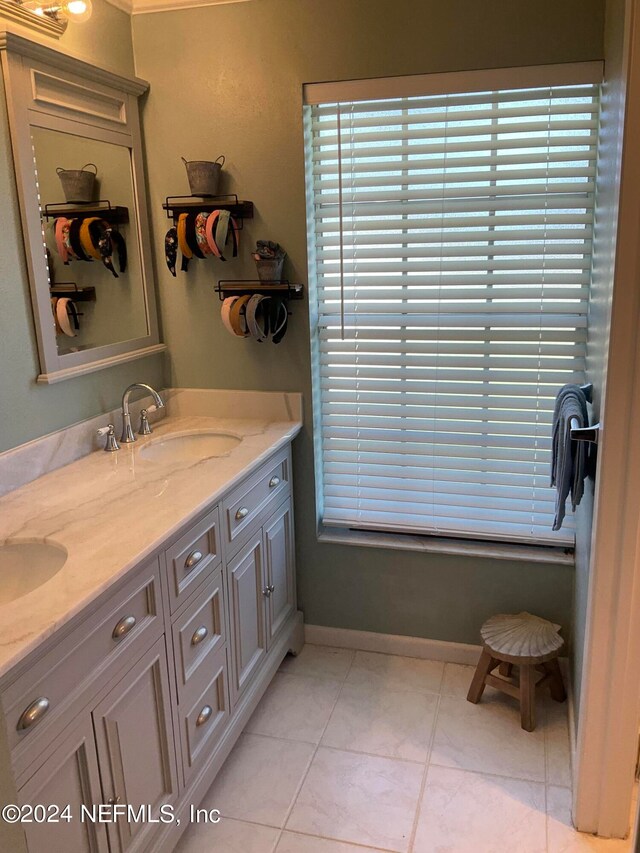 bathroom featuring vanity and tile patterned flooring