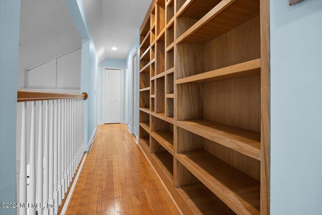 walk in closet featuring light wood-type flooring