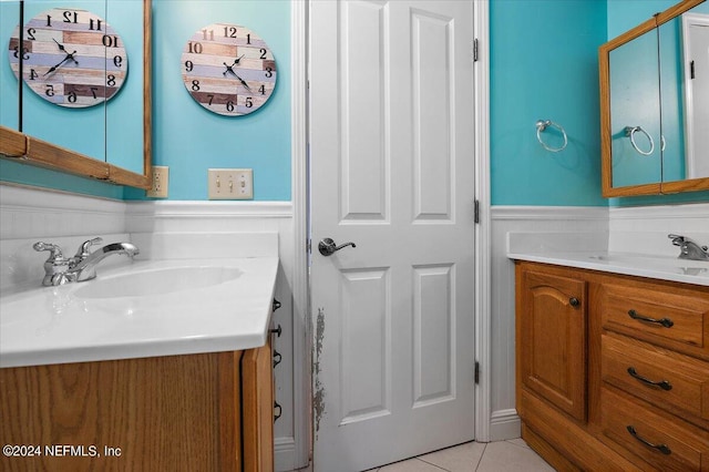 bathroom featuring vanity and tile patterned flooring