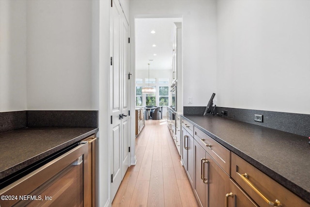 kitchen with light hardwood / wood-style floors