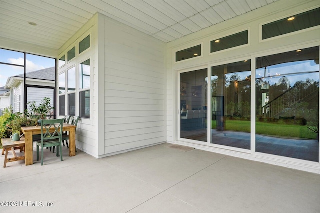 unfurnished sunroom featuring plenty of natural light