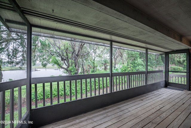 wooden terrace with a water view