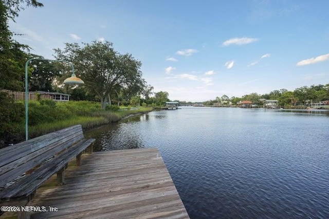 view of dock with a water view