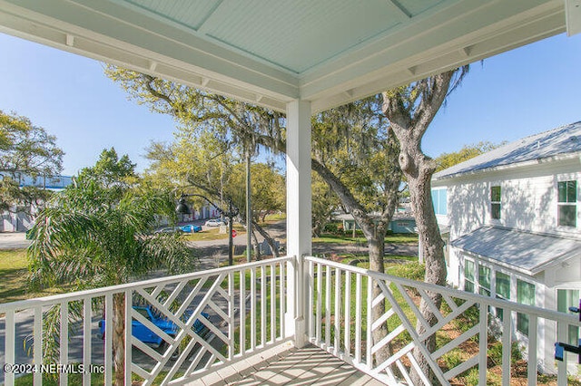 balcony featuring a porch