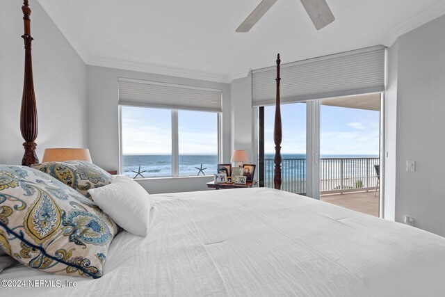 bedroom featuring a water view, ceiling fan, and crown molding