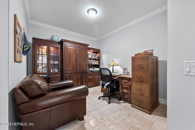 home office with a textured ceiling and ornamental molding