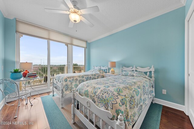 bedroom with ceiling fan, crown molding, hardwood / wood-style floors, a textured ceiling, and access to outside