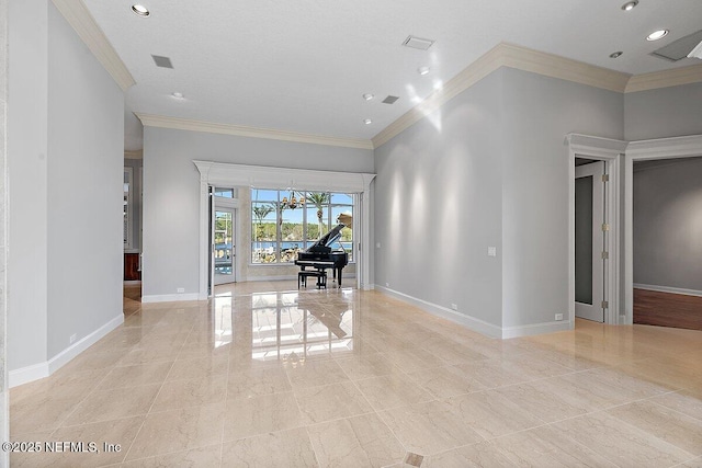 empty room with a high ceiling and ornamental molding