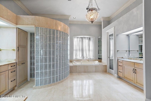 bathroom with tiled tub, crown molding, vanity, and a chandelier