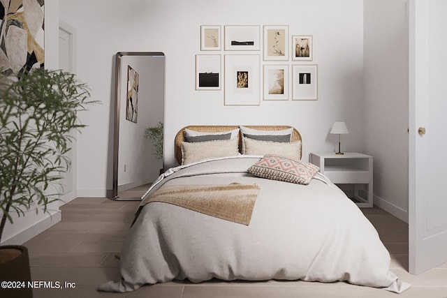 bedroom featuring wood-type flooring