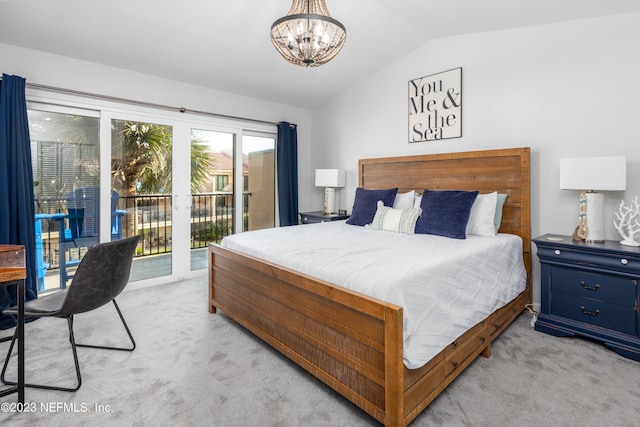 carpeted bedroom featuring french doors, a notable chandelier, access to outside, and vaulted ceiling