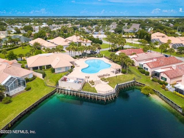 drone / aerial view with a water view