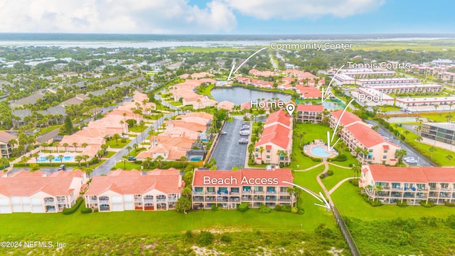 drone / aerial view with a water view