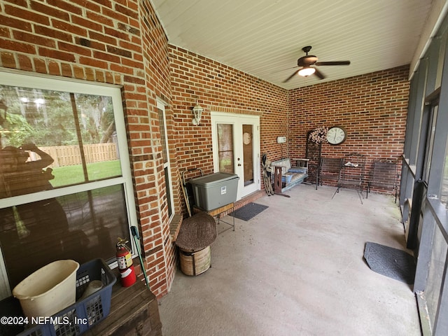 view of patio / terrace featuring ceiling fan and french doors