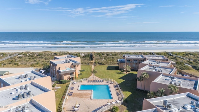 aerial view featuring a view of the beach and a water view