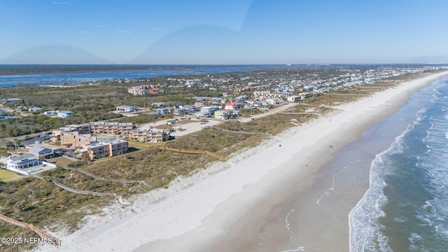 bird's eye view with a view of the beach and a water view