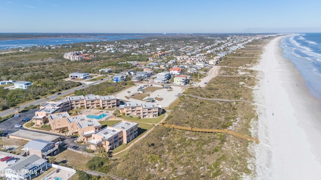 bird's eye view with a view of the beach and a water view