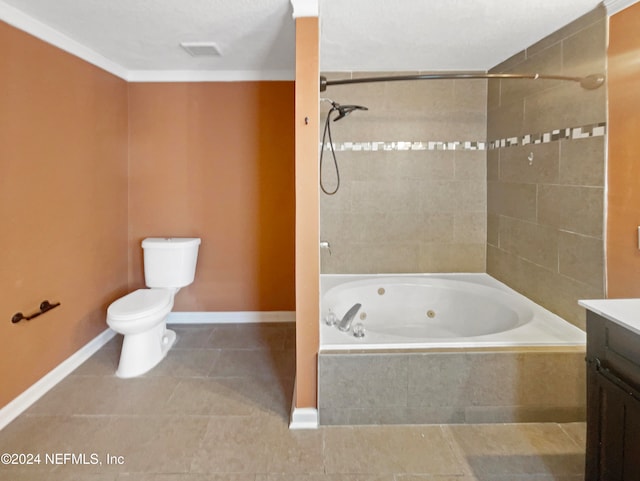 full bathroom with toilet, tile patterned flooring, tiled shower / bath, ornamental molding, and vanity