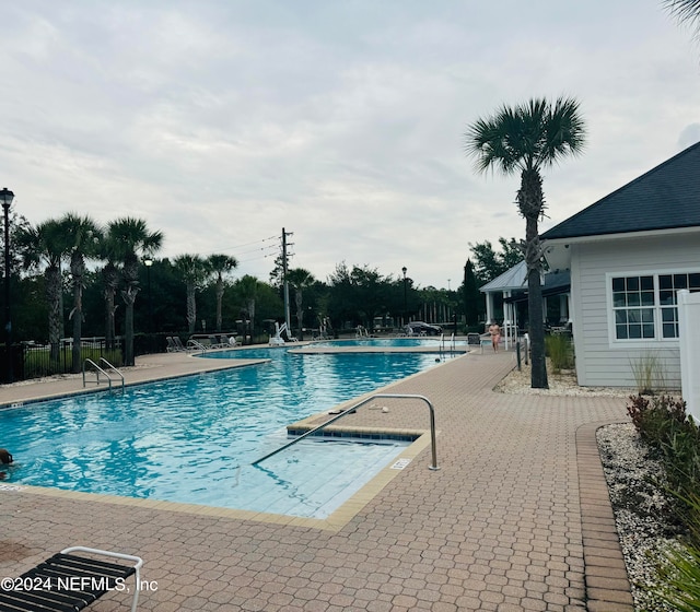 view of pool with a patio