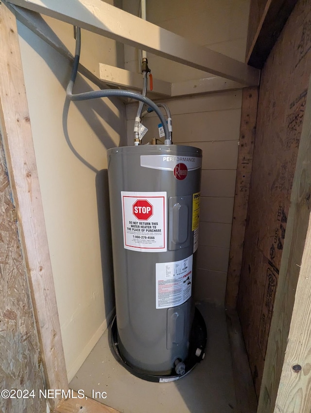 utility room with water heater