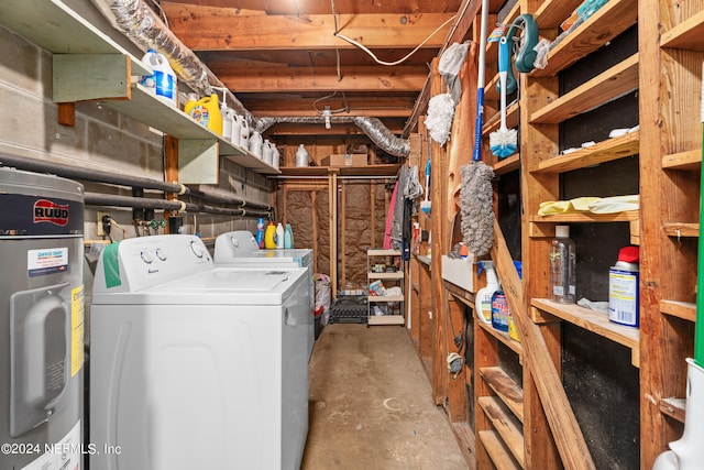 interior space with washing machine and clothes dryer and electric water heater