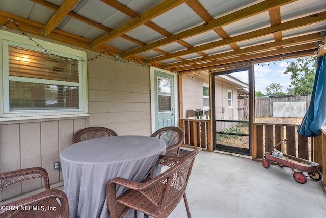 sunroom / solarium featuring plenty of natural light