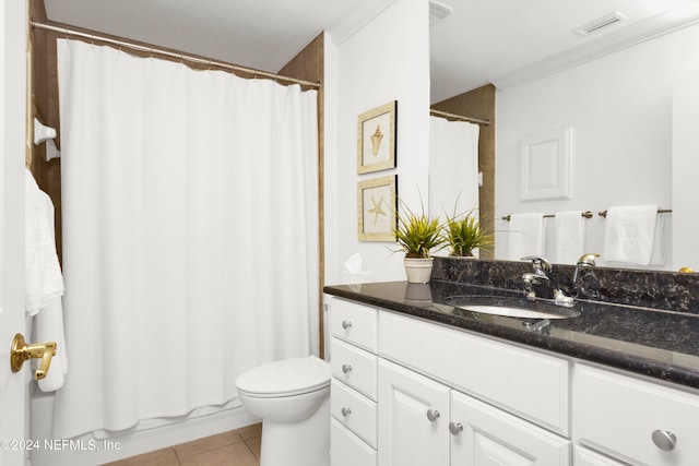 bathroom with vanity, toilet, curtained shower, crown molding, and tile patterned flooring