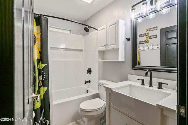 full bathroom featuring shower / bath combination with curtain, vanity, and toilet